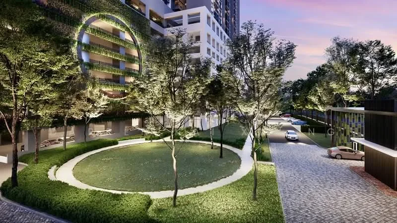 Exterior type: high-rise condominium; features: landscaped garden with circular lawn, manicured greenery, paved walkway, multiple trees, modern building facade, car parking area, surrounding greenery, evening lighting, adjacent driveway; style: modern.