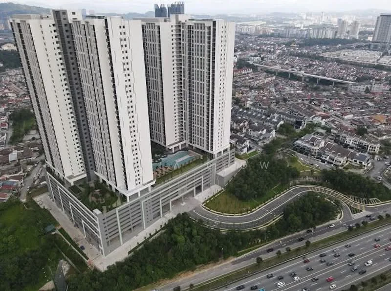 Exterior type: high-rise condominium; features: glass curtain wall, white painted facade, multiple recessed balconies, approximately 20-storey high-rise, landscaped garden area, swimming pool deck, surrounded by mature greenery, urban context with nearby residential areas, access road leading to the building, parking deck visible; style: modern.