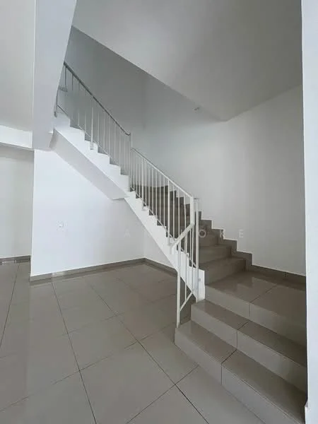 Room features: white painted walls, grey tiled flooring, staircase with metal railing, open space, high ceiling, natural light from windows, neutral color palette, no visible furniture; style: modern.