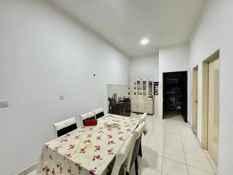 Dining features: white painted walls, tile flooring, dining table with floral tablecloth, 6 upholstered dining chairs in white, built-in cabinetry, doorway to kitchen, doorway to hallway, overhead lighting.