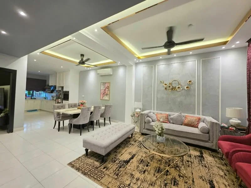 Living features: 3-seater fabric sofa in light grey, 2-seater armchair in red, glass coffee table, area rug with geometric pattern, ceiling with recessed lighting, 2 ceiling fans, wall-mounted artwork, decorative wall paneling, white painted walls, tile flooring; style: modern. Dining features: 6-seater dining table, upholstered dining chairs, pendant lighting above dining table, white painted walls, tile flooring; style: modern. Kitchen features: kitchen island, white cabinetry, stainless-steel appliances, tile backsplash, granite countertop, open layout to living area; style: modern.