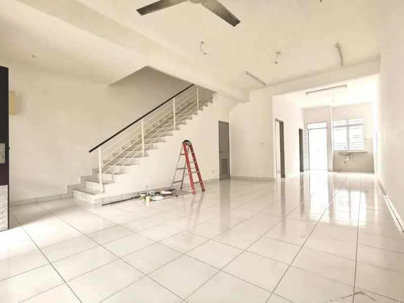 Living features: white painted walls, white tiled flooring, 5-blade ceiling fan, staircase with white railing, large windows for natural light, door to hallway, ladder in the room, unfinished wall with paint supplies; style: minimalist.