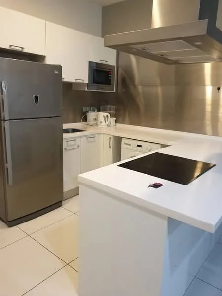 Kitchen features: stainless-steel fridge, built-in microwave, stainless-steel range hood, induction cooktop, white quartz countertop, white cabinetry, kettle, toaster, tile flooring, recessed downlights, chrome faucet; style: modern.