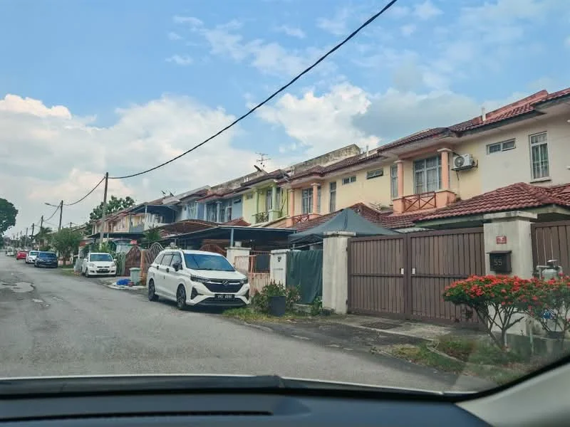 Exterior type: linked terrace house; features: two-storey linked terrace houses, red tiled roof, cream painted facade, balconies on upper floors, driveways for parking, manicured front gardens, visible air conditioning units, street view with power lines, surrounded by residential area; style: modern.