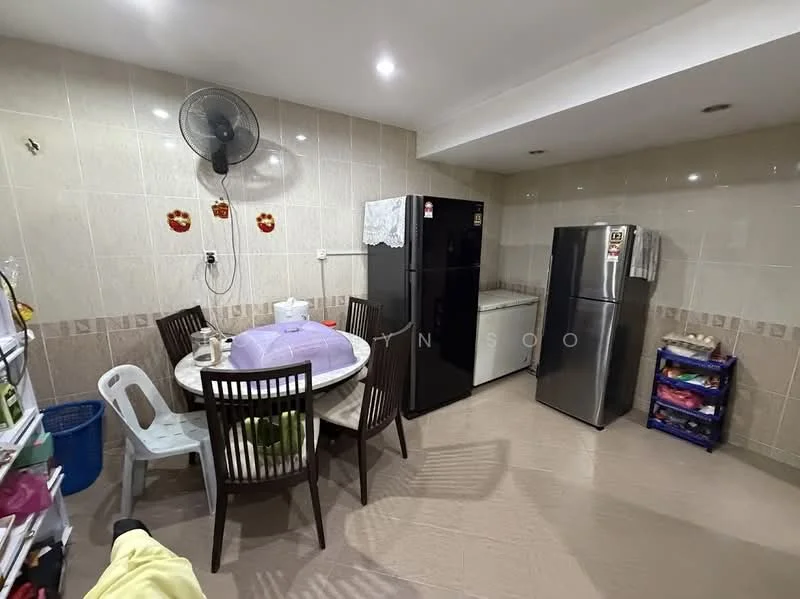 Dining features: round dining table, 4 dining chairs, white plastic chair, 2 stainless-steel fridges, ceiling fan, tile flooring, cream tiled walls, shelving unit, blue laundry basket.