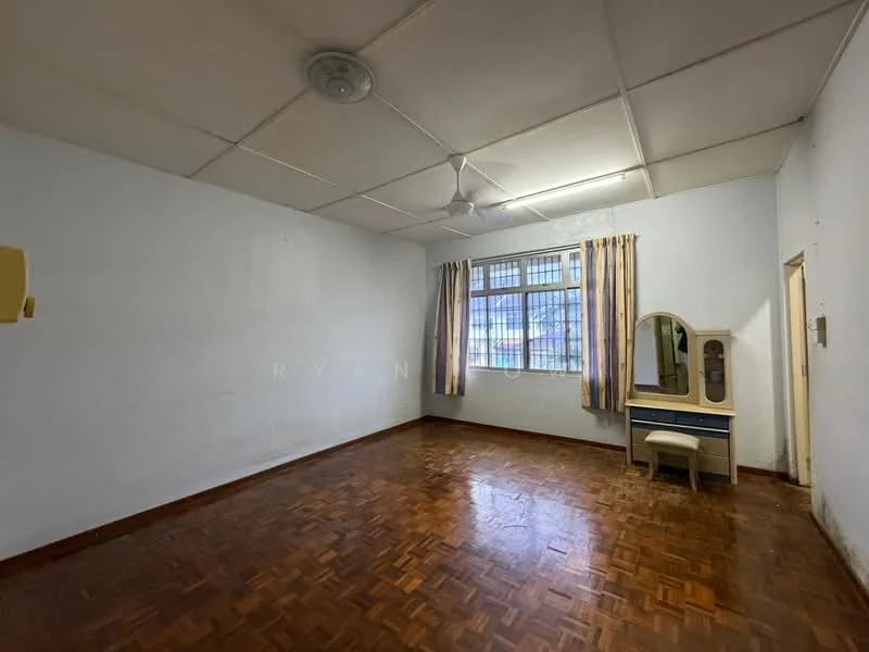 Room features: white painted walls, parquet wood flooring, ceiling fan, window with curtains, dressing table, mirror, light fixture, corner for potential storage.