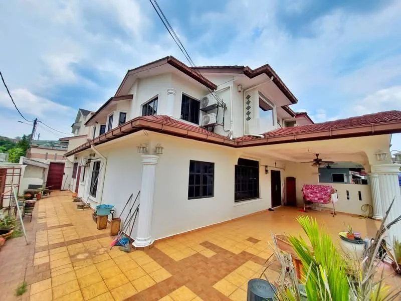 Exterior type: detached bungalow; features: white painted facade, red tiled roof, two-storey structure, covered porch area, paved walkway, outdoor ceiling fan, multiple windows, garden area with pots, exposed columns, surrounding greenery; style: modern.