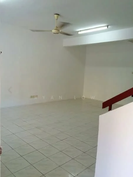 Room features: white painted walls, tile flooring, ceiling fan, fluorescent ceiling light, open layout, staircase with red railing.