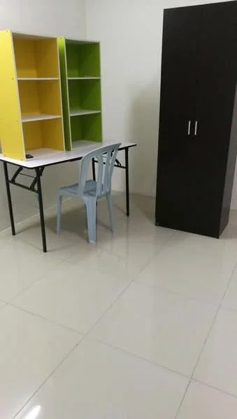 Study features: white walls, glossy tile flooring, black storage cabinet, yellow and green open shelving units, white desk, blue plastic chair; style: modern.