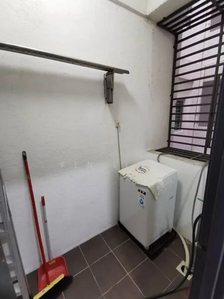 Laundry features: white washing machine, grey tiled flooring, white painted walls, metal drying rack, window with security bars, cleaning tools (broom and dustpan).