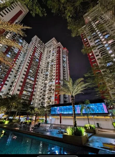 Exterior type: high-rise condominium; features: glass curtain wall, red and white painted facade, approximately 20-storey high-rise, infinity pool with loungers, landscaped garden with palm trees, outdoor lighting, pool deck with seating, manicured lawn; style: modern.
