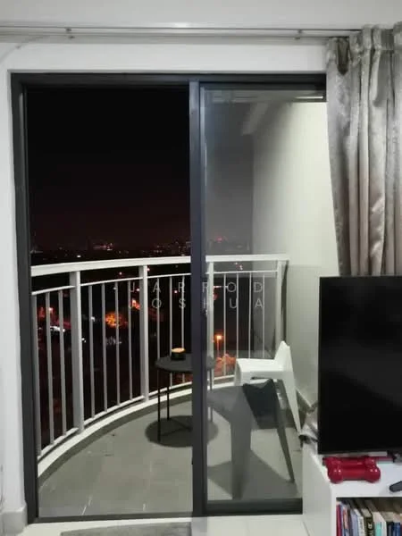 Balcony features: glass sliding door, white railing, grey tiled flooring, small round table, white chair, city skyline view, curtains, TV console; view: city.