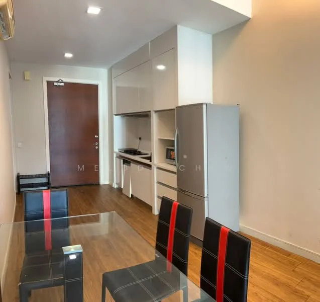 Dining features: glass dining table, 4 black dining chairs with red accents, wood laminate flooring, white cabinetry, built-in kitchen counter, stainless-steel fridge, kitchenette with stove, wall-mounted split AC, main entrance door, neutral painted walls; style: modern.