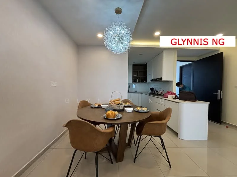 Dining features: round dining table, 4 dining chairs in brown, chandelier light fixture, white painted walls, grey tiled flooring, open kitchen layout, kitchen cabinetry, countertop with bar seating; style: modern.