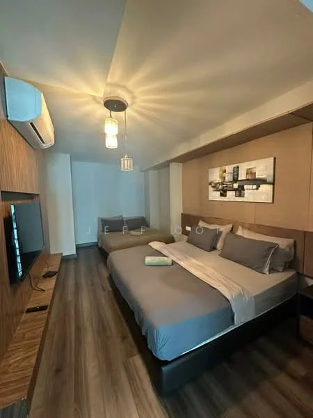 Bedroom features: king-size bed with grey bedding, single bed with grey bedding, wooden accent wall, wall-mounted TV, wooden bedside table, recessed ceiling lights, 5-blade ceiling fan, laminate flooring, decorative wall art, air conditioning unit; style: modern.