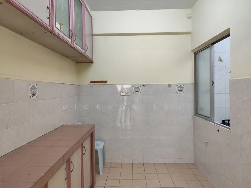 Kitchen features: pink cabinetry with glass fronts, white tiled walls, beige tiled flooring, countertop with pink tiles, single-bowl stainless-steel sink, window with sliding glass, stool, wall-mounted tiles with decorative pattern.