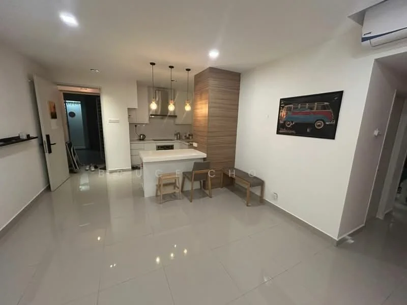 Kitchen features: white cabinets, wood panel accent wall, island with seating, pendant lighting, stainless-steel sink, built-in oven, stove with hood, grey tiled flooring, refrigerator, open layout, wall-mounted air conditioning unit; style: modern.