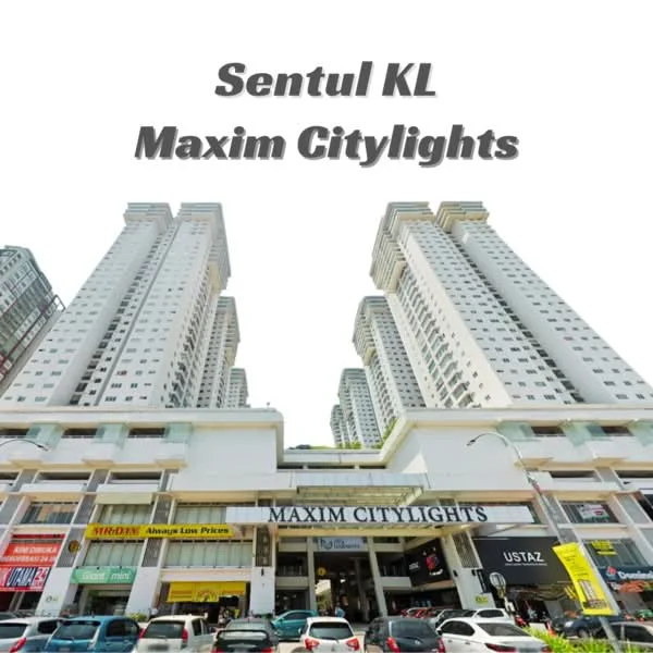 Exterior type: high-rise condominium; features: glass curtain wall, white painted facade, multiple storeys, balconies on upper floors, commercial units at ground level, signage visible on facade; style: modern.