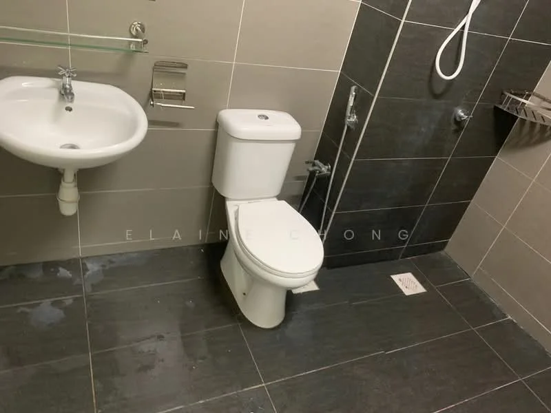 Bathroom features: white pedestal sink, chrome faucet, white toilet, shower with handheld showerhead, grey wall tiles, black floor tiles, glass shelf, towel rack, drain in floor; style: modern.