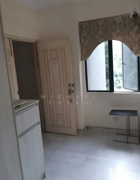 Room features: white painted walls, marble flooring, large window with view, wooden door, built-in cabinetry, small table, curtains, natural light.
