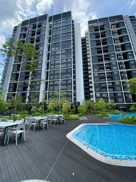 Exterior type: high-rise condominium; features: two high-rise buildings, swimming pool, wooden deck around pool, outdoor dining area with tables and chairs, manicured landscaping with trees and shrubs, blue tiled pool, glass balcony railings, modern architectural design, surrounding greenery; style: modern.