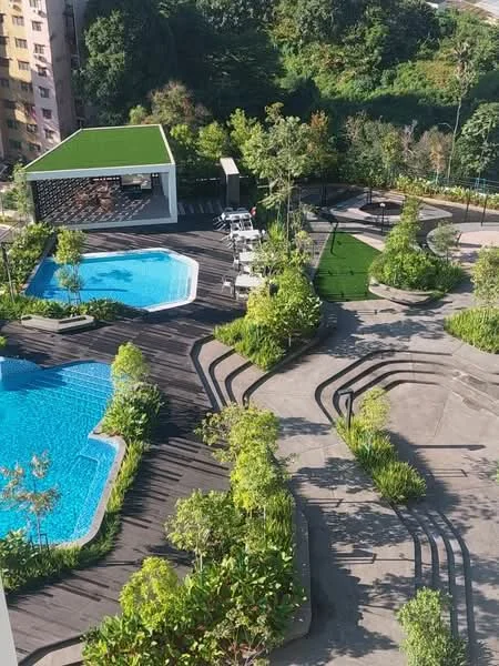 Exterior type: landscape garden; features: infinity pool, swimming pool, pool deck with loungers, manicured landscaping, tropical plants, green lawn area, outdoor seating area, pathways with stepping stones, water feature, barbecue pit, children's playground, covered pavilion; style: modern.
