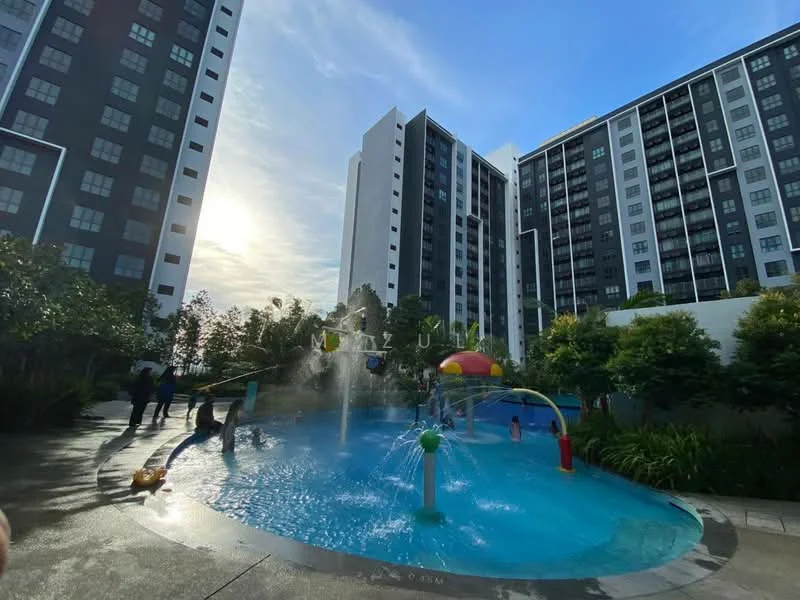 Exterior type: high-rise condominium; features: swimming pool deck, children's splash pool, water play features, surrounding greenery, multiple high-rise buildings, sunset view, landscaped garden area; style: modern.