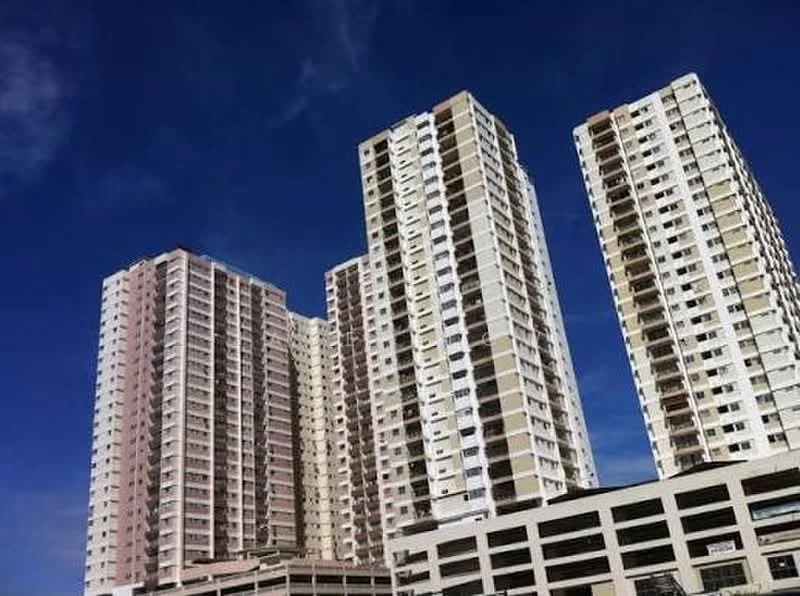 Exterior type: high-rise condominium; features: glass curtain wall, white painted facade, pink painted facade, multiple balconies, approximately 20-storey high-rise, parking deck, surrounded by mature greenery; style: modern.