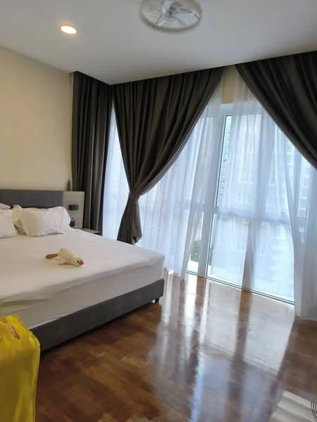Bedroom features: king-size bed, upholstered headboard, white bedding, 2 bedside pillows, floor-to-ceiling windows, sheer curtains, dark grey curtains, wooden flooring, ceiling fan, decorative wall panel, wall-mounted light, nightstand with lamp; style: modern; view: city.