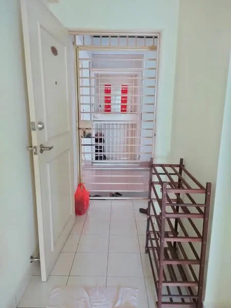 Room features: white painted walls, white tiled flooring, metal security grille door, main entrance door, shoe rack, red plastic bag, slippers on floor, light-colored ceiling; style: modern.