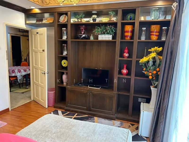 Living features: wooden flooring, built-in wooden shelving unit, flat-screen TV, decorative vases, artificial flowers in vase, wall-mounted air conditioning unit, curtains, recessed ceiling lights, sofa, coffee table, decorative wall art; style: traditional.