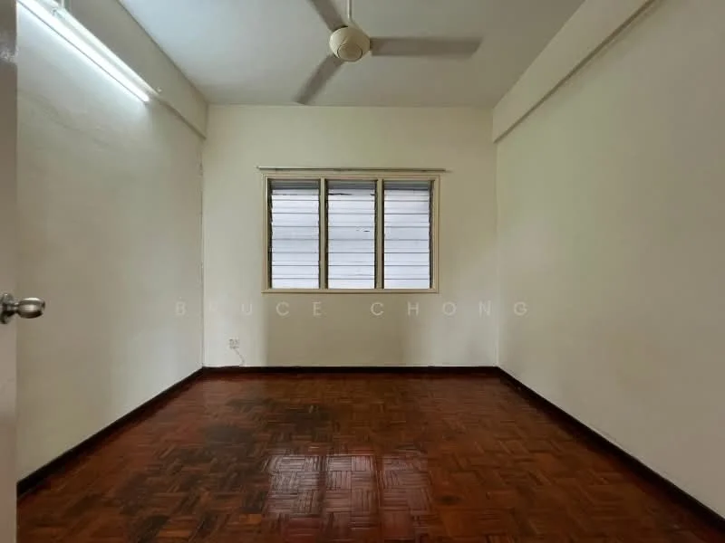Room features: white painted walls, parquet wood flooring, ceiling fan, window with horizontal slats, natural light from window.