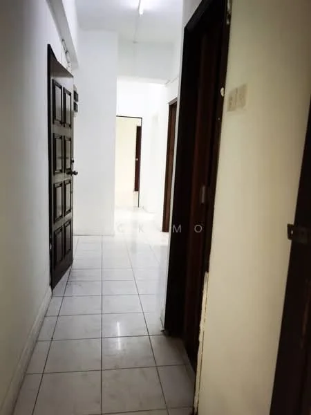 Hallway features: white painted walls, glossy white floor tiles, wooden doors, door frames in dark wood, ceiling lights, straight corridor layout.