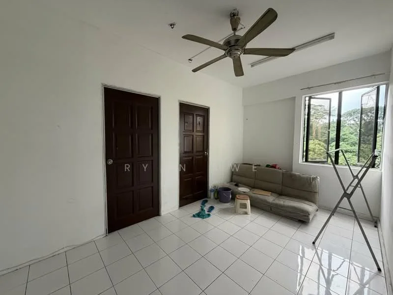 Room features: white painted walls, white tiled flooring, 5-blade ceiling fan, two wooden doors, large window with view, sofa, clothes drying rack, small storage container, blue children's toys; view: garden.