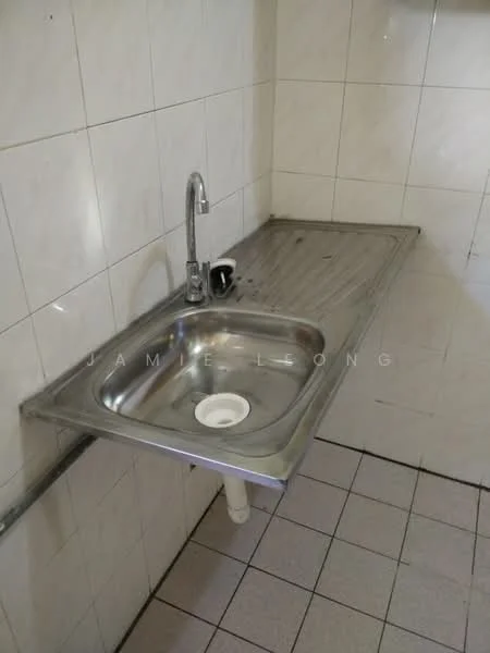 Room features: stainless-steel sink, chrome faucet, tile backsplash, white tiled walls, grey floor tiles, drainage hole, countertop, wall-mounted faucet.