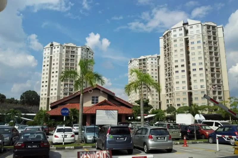 Exterior type: mid-rise condominium; features: two mid-rise buildings, red tiled roof on clubhouse, manicured landscaping, palm trees, open-air parking lot, visible vehicles in parking area, blue sky with clouds, street sign for residents; style: modern.