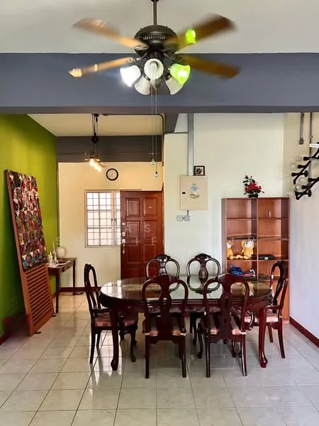 Dining features: round wooden dining table, 6 wooden dining chairs, 5-blade ceiling fan with light, white tiled flooring, green accent wall, wooden display cabinet, decorative wall art, wall-mounted clock; style: modern. Room features: white painted walls, doorway leading to another room, window with grid pattern.