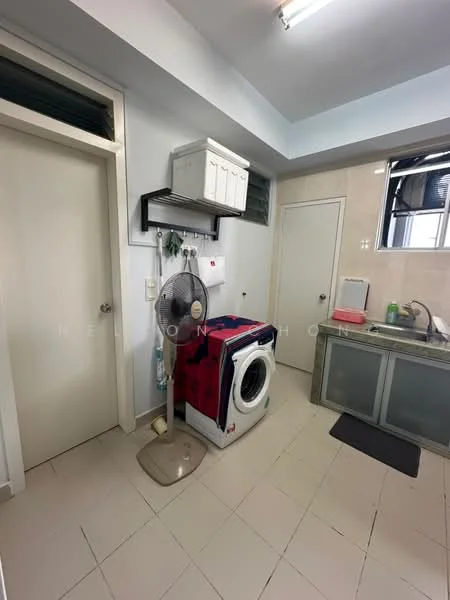 Laundry features: front-load washing machine, white cabinetry, stainless-steel sink, grey countertop, wall-mounted shelf, floor tiles in cream, ceiling-mounted light, door to another room, fan, window for natural light; style: modern.