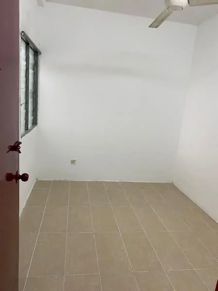 Room features: white painted walls, tile flooring, ceiling fan, window with metal grille, door with handle; style: minimalist.