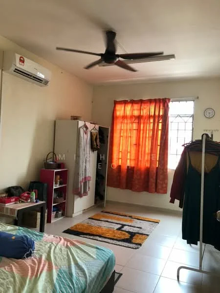 Bedroom features: queen-size bed, 5-blade ceiling fan, wall-mounted split AC, orange sheer curtains, white painted walls, tile flooring, wardrobe with sliding doors, area rug with geometric pattern, clothes rack, clock on wall.