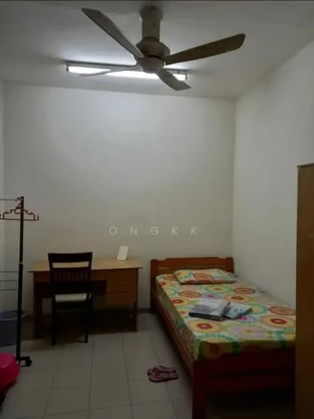 Bedroom features: single bed with colorful bedding, wooden desk with chair, ceiling fan, tile flooring, white painted walls, window with no visible treatment, clothes rack, small area rug.