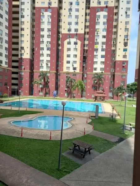 Exterior type: high-rise condominium; features: swimming pool, pool deck, landscaped garden, palm trees, manicured lawn, outdoor seating area with benches, children's playground, multi-storey building, red and cream painted facade, balconies on upper floors; style: modern.