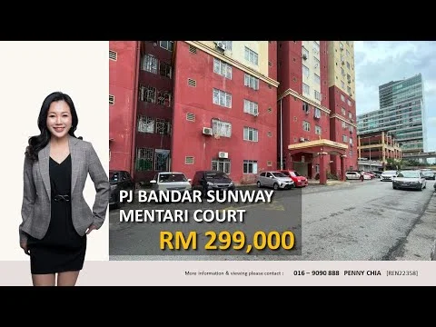 Exterior type: low-rise apartment block; features: red painted facade, multiple air conditioning units visible, parking lot with marked spaces, surrounding greenery, adjacent high-rise buildings, driveway with interlocking pavers; style: modern.