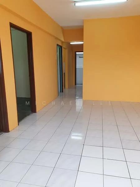 Room features: orange painted walls, white tiled flooring, fluorescent ceiling lights, doorway leading to another room, doorway leading to kitchen, open layout, neutral decor; style: modern.
