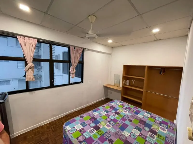 Bedroom features: queen-size bed with colorful patterned bedding, built-in wooden wardrobe, floor-to-ceiling windows, curtains in light pink, ceiling fan, wooden parquet flooring, white painted walls, recessed ceiling lights; style: modern.