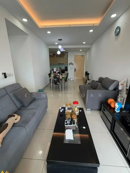 Living features: grey fabric 3-seater sofa, black coffee table, wall-mounted TV, TV console, recessed ceiling lights, pendant light fixture, white painted walls, glossy tile flooring, decorative wall clock, open layout to dining area, decorative items on coffee table; style: modern. Dining features: dining table with multiple chairs, kitchen area visible in background, wood cabinetry, countertop, refrigerator visible, kitchen appliances visible; style: modern.
