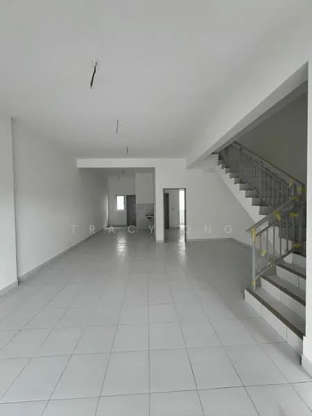 Room features: white painted walls, grey tiled flooring, staircase with metal railing, large windows for natural light, open layout, high ceiling, no visible furniture, neutral color scheme; style: modern.