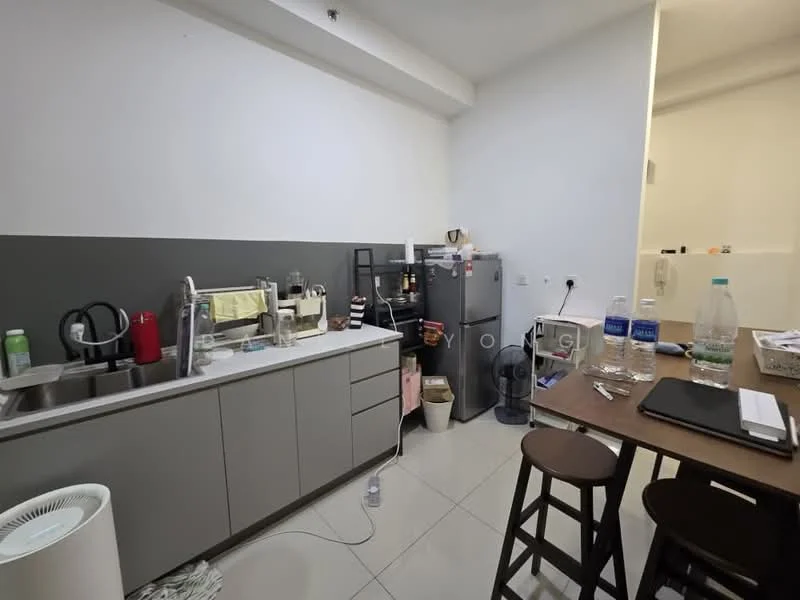 Kitchen features: grey cabinetry, stainless-steel sink, chrome faucet, built-in refrigerator, countertop with appliances, ceramic tile flooring, white walls, kitchen island, stool seating, open shelving, wall-mounted light, water bottles on table; style: modern.