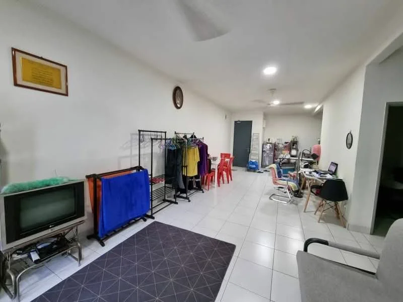 Room features: white painted walls, tile flooring, ceiling fan, recessed lighting, TV unit, clothes rack, folding chairs, computer desk, area rug with geometric pattern, red plastic chairs, laundry drying rack, wall clock; style: minimalist.
