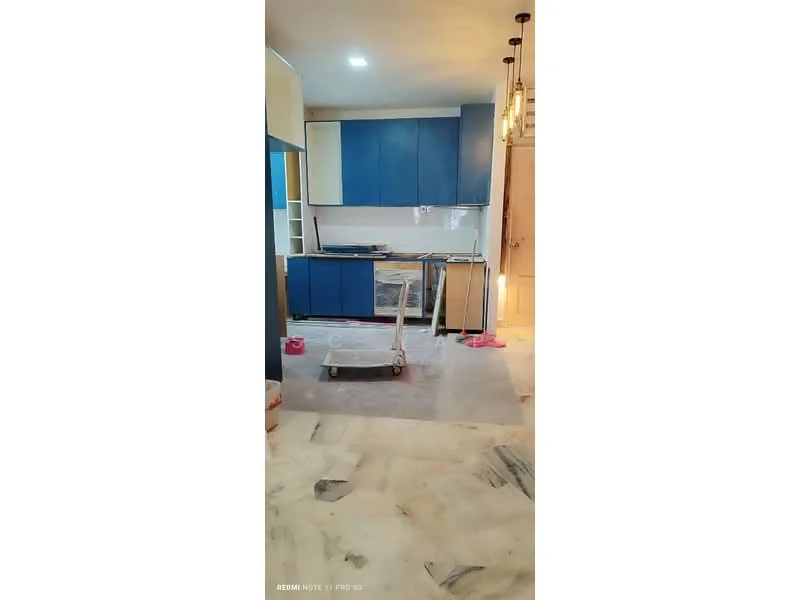 Kitchen features: blue cabinetry, white countertop, stainless-steel sink, chrome faucet, pendant lighting, marble tile flooring, open shelving, kitchen island, built-in oven, freestanding range oven; style: modern.